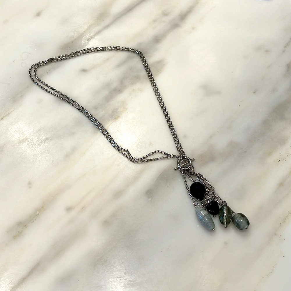 Lia Sophia long or wrap necklace.